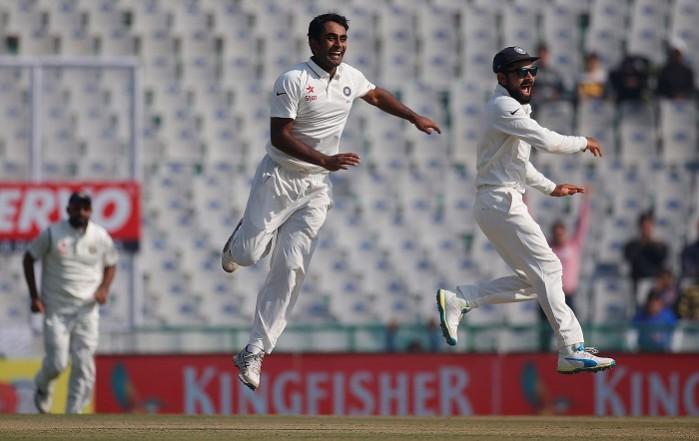 India off-spinner Jayant Yadav and captain Virat Kohli celebrate the wicket of England batsman Joe Root, November 26, 2016 Jayant Yadav Virat Kohli India
