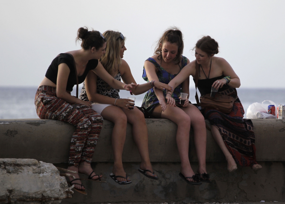 fidel castro obama economy cuban tourism beaches loved ones Caribbean islands peso diplomatic relations war cold war russia ussr satellite cuban missile crisis soviet russia