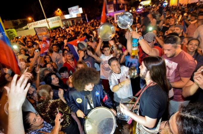 People celebrate the death of Cuban leader Fidel Castro, in Little Havana, Miami, Florida, U.S. November 26, 2016. Miami