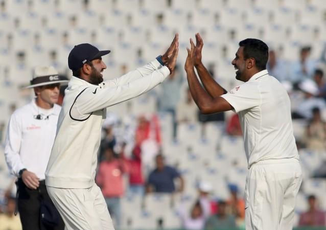 R Ashwin picked up three wickets in the final session after striking a half-century for India in the third Test match against England, November 28, 2016 Cheteshwar Pujara R Ashwin India