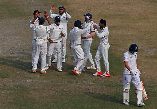 India players celebrate the wicket of England batsman Joe Root, November 29, 2016 India Joe Root England