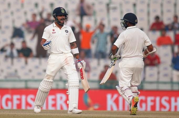 India batsmen Virat Kohli and Parthiv Patel celebrate after defeating England in the third Test, November 29, 2016 Virat Kohli Parthiv Patel India