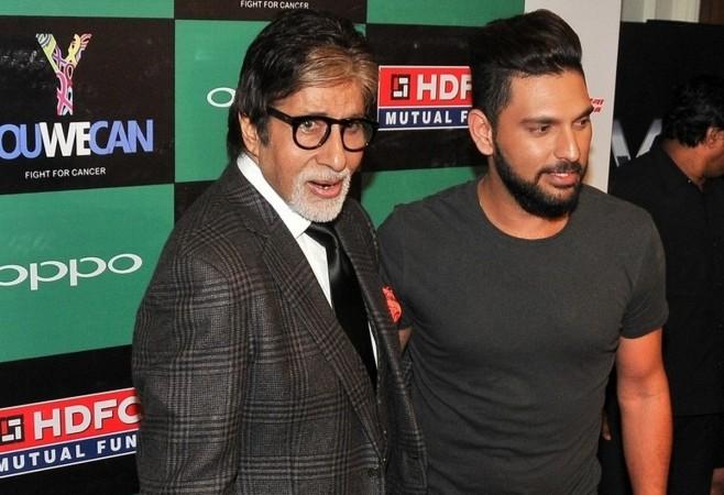Yuvraj Singh with Amitabh Bachchan during a fashion event yuvraj singh