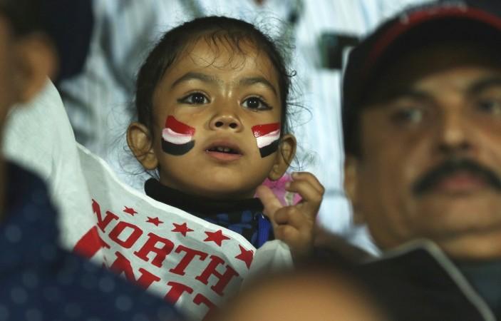 Your team is definitely chasing history, kid! In picture: A NorthEast United FC fan in attendance in Guwahati on Wednesday evening isl