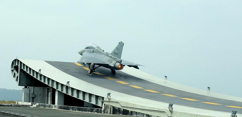 Indian Navy looking for another aircraft for its carrier operation within another five years. In Picture: HAL Naval Tejas prototype takes-off from the Shore Based Test Facility at INS Hansa, Goa LCA Navy