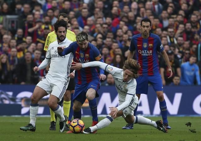 Barcelona talisman Lionel Messi was kept quiet in the first half by Real Madrid Lionel Messi Barcelona Luka Modric Isco Real Madrid
