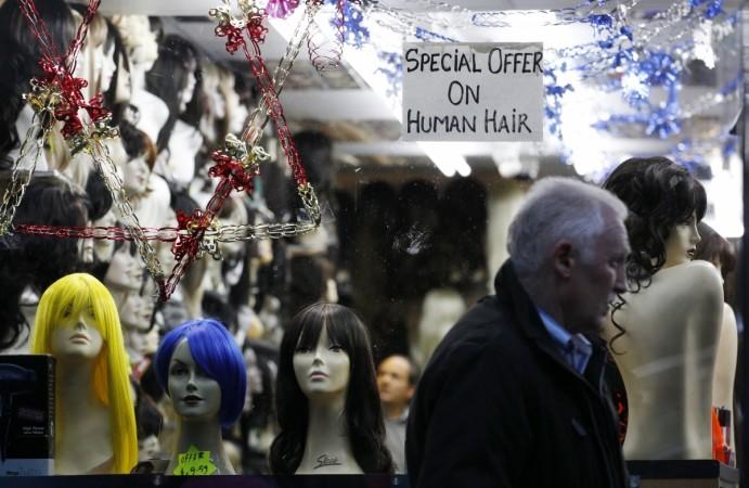 hair tonsure ttd tirupati hindu devotees practice ritual money hair exports wigs india news temple