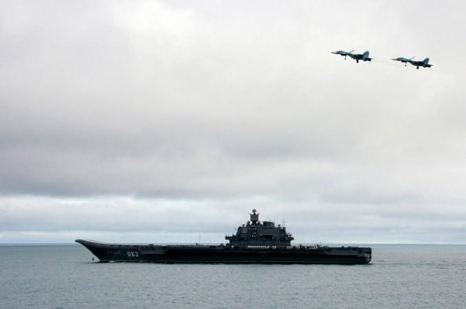 Russia loses its fighter aircraft after skidding off Admiral Kuznetsov. In Picture: Jet fighters fly over the Russian aircraft-carrier 'Admiral Kuznetsov' during military exercises in the Barents Sea. Jet fighters fly over the Russian aircraft-carrier 'Admiral Kuznetsov' during military exercises in the Barents Sea, August 17, 2005. Russian fighter jet skids off aircraft carrier