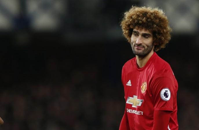 Nothing's work eh, Marouane? Pictured: Manchester United's Fellaini reacts after giving away a penalty against Everton at Goodison Park last Sunday fellaini