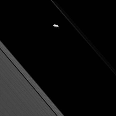 Surface features are visible on Saturn's moon Prometheus in this view from NASA's Cassini spacecraft. Most of Cassini's images of Prometheus are too distant to resolve individual craters, making views like this a rare treat. Saturn's moon Prometheus