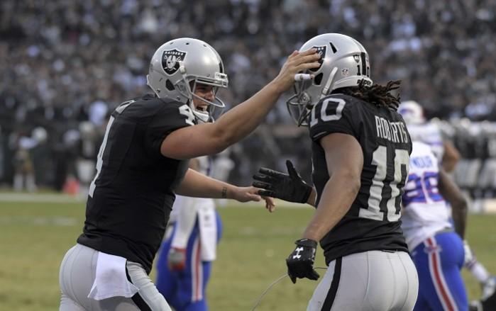 Derek Carr and Seth Roberts celebrate a touchdown for the Oakland Raiders in their game against the Buffalo Bills, December 4, 2016 Derek Carr Seth Roberts Oakland Raiders