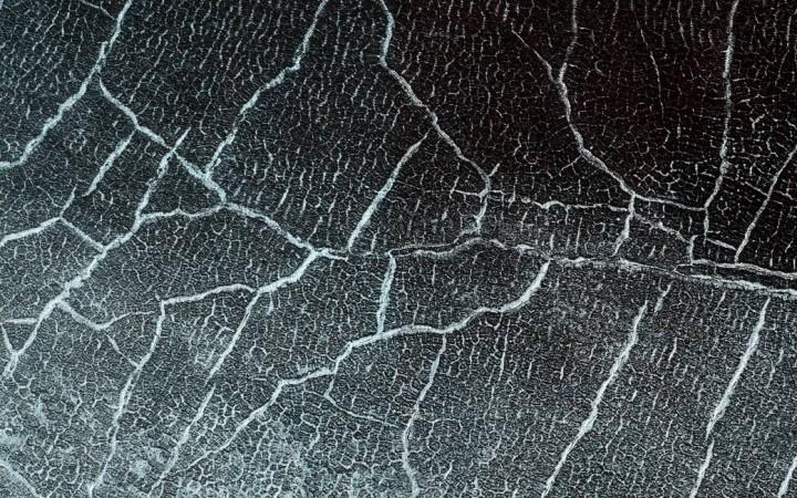 Various Martian impact craters were filled with ice due to the environment in the past. A bright white outline is formed because of the seasonal frost is clearly visible in this image taken during the spring-time. Martian impact craters