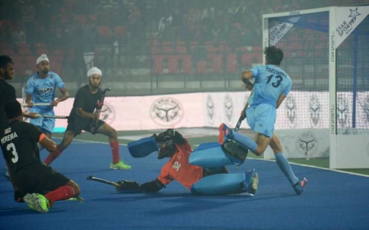 Players in action during the 11th FIH Junior Hockey World Cup match between India and Canada in Lucknow on Dec 8, 2016 hockey