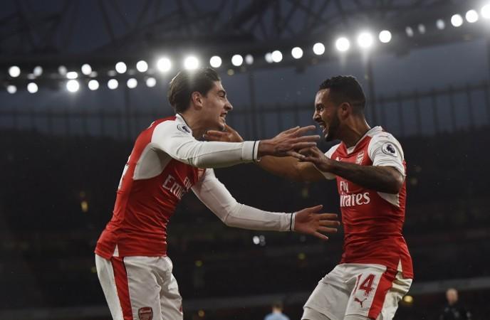 Hector Bellerin and Theo Walcott celebrate after the equalising goal against Stoke City in the Premier League, December 10, 2016 Hector Bellerin Theo Walcott Arsenal