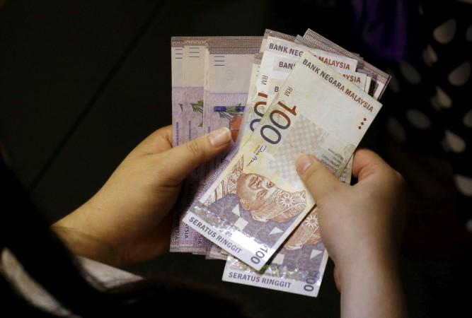 malaysia stock exchange wealth fund investment nomura holdings hnis ringgit