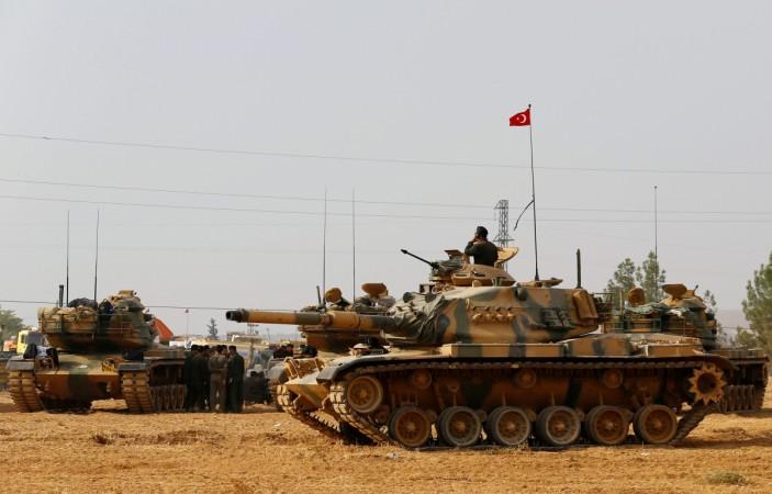 Turkey has launched a new military satellite for intelligence, surveillance, and reconnaissance (ISR) functions. In Picture: Turkish army tanks and military personal are stationed in Karkamis on the Turkish-Syrian border in the southeastern Gaziantep province, Turkey, August 25, 2016. Military satellite of Turkey