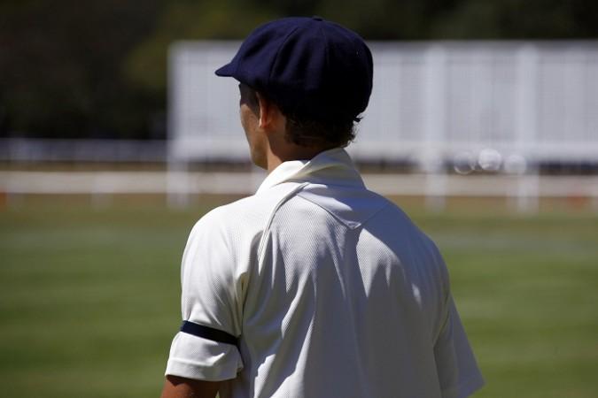 Pictured: A young cricketer wears a black armband as a tribute to Australian cricketer Phillip Hughes, who died on Thursday, during a schoolboy's cricket match at Centennial Park in Sydney November 29, 2014. Black armbands