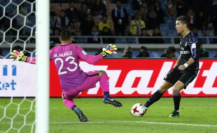 Real Madrid's Cristiano Ronaldo scores their second goal at the Yokohama International Stadium in Japan against Club America real madrid