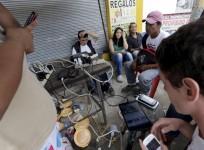 Residents use the internet via the free wifi and charge their mobile phone batteries