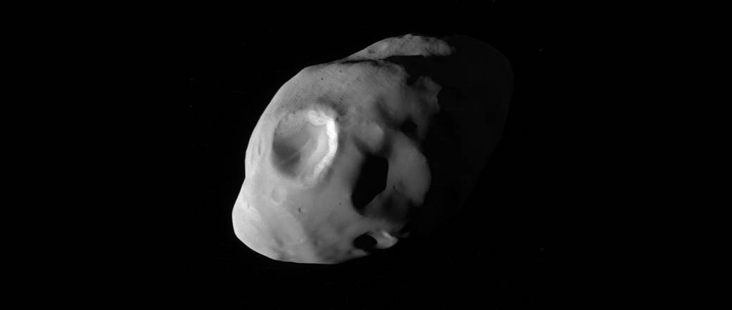 This image from NASA's Cassini spacecraft is one of the highest-resolution views ever taken of Saturn's moon Pandora. Pandora (52 miles, 84 kilometers) across orbits Saturn just outside the narrow F ring. Pandora, Saturn's moon, Saturn, moon,