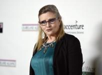 Carrie Fisher suffers a heart attack