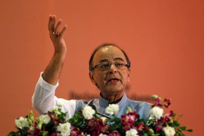Finance Minister Arun Jaitley gestures as he addresses a gathering during a seminar on 'Income Declaration Scheme-2016' in Ahmedabad, July 10, 2016. Finance minister Arun Jaitley