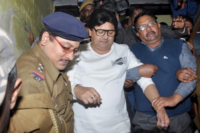 Trinamool Congress MP Tapas Pal being taken to a CBI court in Odisha. Tapas Pal