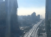 Time-lapse footage shows smog engulfing Beijing