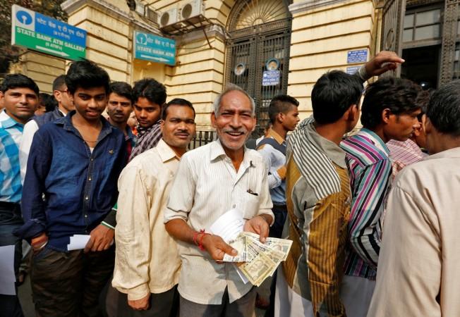 demonetisation, remonetisation, rbi update, digital india, cashless economy, modi, niti aayog, bibek debroy