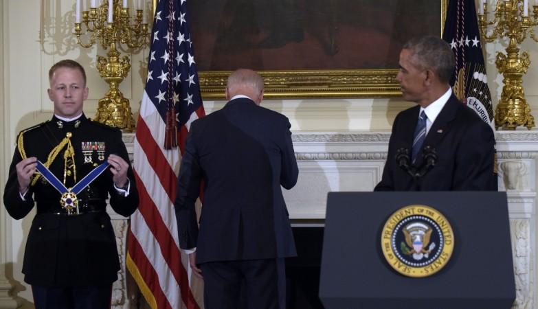An emotional Joe Biden turns around to wipe his tears after the announcement. Joe Biden