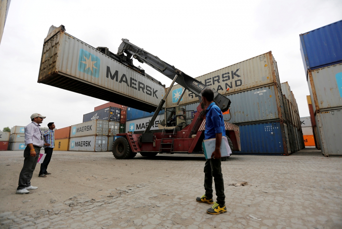 India's exports rise 6% in December; trade deficit shrinks sharply ...