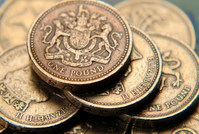 One pound, UK currency, coins, pound, brexit