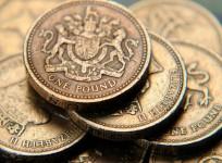 One pound, UK currency, coins, pound, brexit