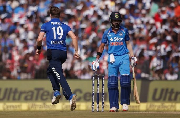 England fast bowler Chris Woakes celebrates the wicket of India opener KL Rahul Chris Woakes, England, KL Rahul, India, 2nd ODI