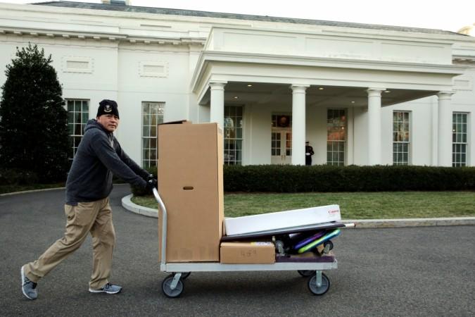 A man moves boxes during U.S. President Barack Obama's last full day at the White House The White House