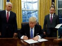 President Donald Trump signs executive order withdrawing US from TPP trade deal