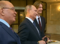 Watch Vladimir Putins particularly awkward karaoke session