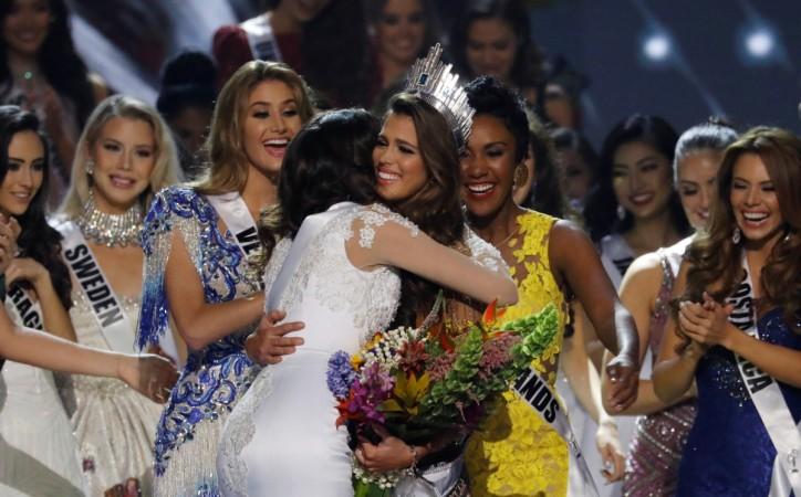 Contestants congratulate Miss France Iris Mittenaere after she was declared the winner of the Miss Universe beauty pageant at the Mall of Asia Arena, in Pasay, Metro Manila, Philippines January 30, 2017. Miss Universe 2016