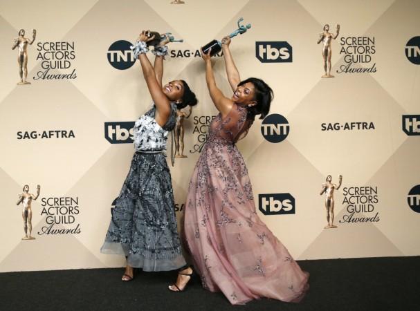 Actresses Janelle Monae (L) and Taraji P. Henson pose with their award for Outstanding Performance by a Cast in a Motion Picture for Hidden Figures SAG Awards 2017