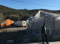 Refugees outside the Moria camp on the Greek island of Lesbos