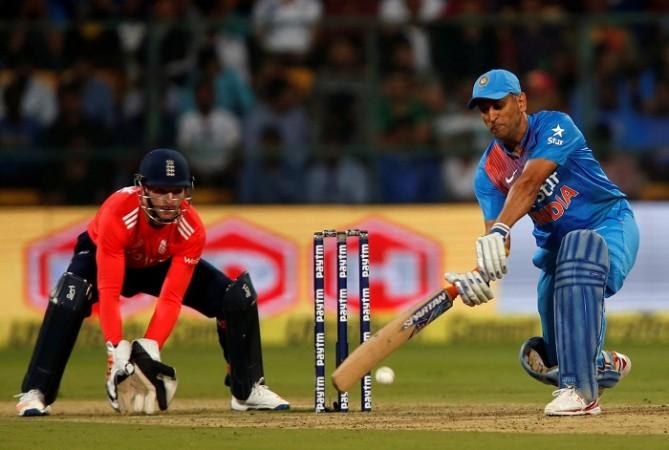 India batsman MS Dhoni in a punishing mood during his half-century against England in the third T20 match, February 1, 2017 Jos Buttler, England, MS Dhoni, India, 3rd T20