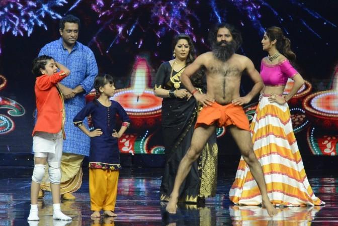 Yoga guru Baba Ramdev with filmmaker Anurag Basu, choreographer Geeta Kapoor and actress Shilpa Shetty on the sets of Sony TV reality show Super Dancer in Mumbai on Oct. 17, 2016 patanjali ayurved, patanjali products, baba ramdev, patanjali icra rating, patanjali ayurved, patanjali food park, barc india, hul share price, india top brands