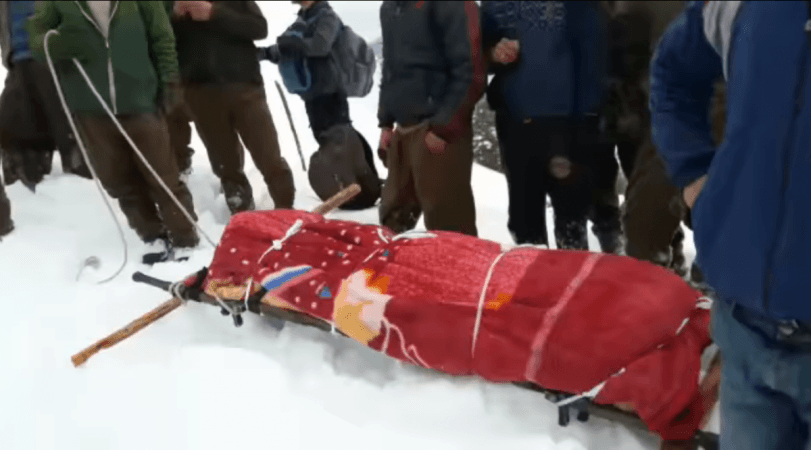 kashmiri soldier, treks with mothers body in snow