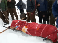 kashmiri soldier, treks with mothers body in snow