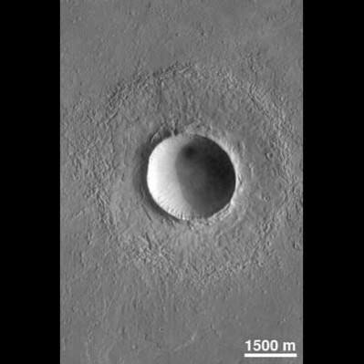 This crater on northern Elysium Planitia is a bit more than twice the diameter of the famous Meteor Crater in Arizona. The image is taken by Mars Global Surveyor in July, 1998. nasa, Mars, crater, space