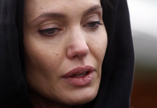Angelina Jolie heartbroken of losing Brad Pitt Angelina Jolie, crying, woman,