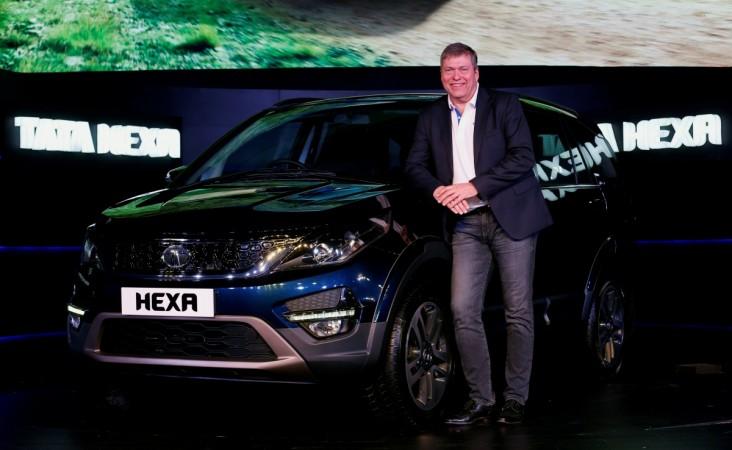 Guenter Butschek, Tata Motors' CEO and Managing Director, poses with a Hexa car during its launch in Mumbai, India, January 18 2017. tata motors, tata motors share price, tata motors share price, tata motors ceo, tata motors stock upgrade, jlr sales