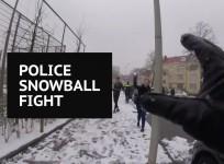 Dutch police officers take on local kids in snowball fight