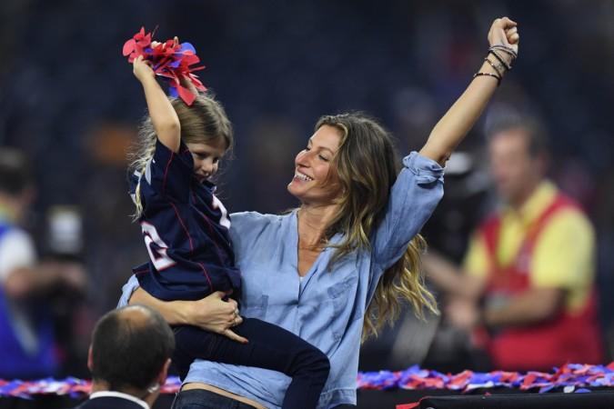 Feb 5, 2017; Houston, TX, USA; Gisele Bundchen and her daughter Vivian Brady celebrate after the game between the Atlanta Falcons and the New England Patriots during Super Bowl LI at NRG Stadium kraft heinz news, 3g capital, gisele bundchen, kraft heinz bids for unilever, kraft heinz bids $143 billion for, 3g capital kraft heinz, fmcg company unilever