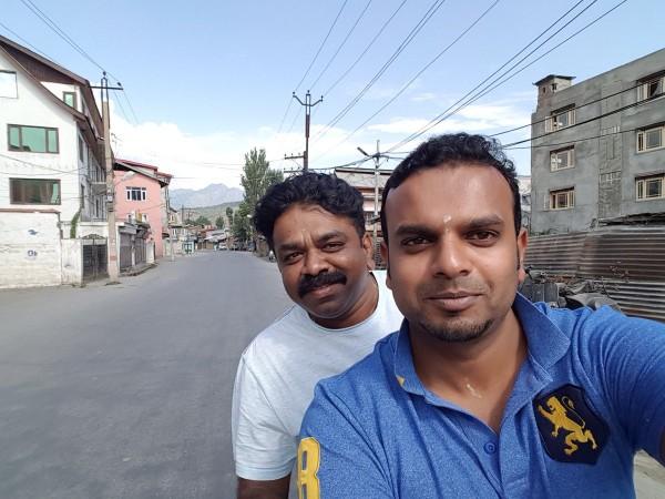 Director Krishna (Behind) with producer Umapathy. Director Krishna with producer Umapathy